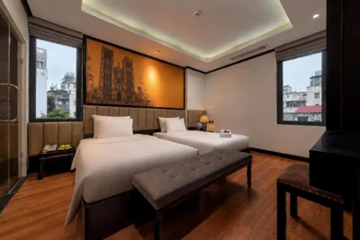Deluxe tweepersoonskamer met twee aparte bedden of een tweepersoonsbed en uitzicht op de stad — Ja Cosmo Premier Hotel