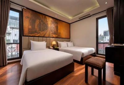 Driepersoonskamer met uitzicht op de stad — Ja Cosmo Premier Hotel